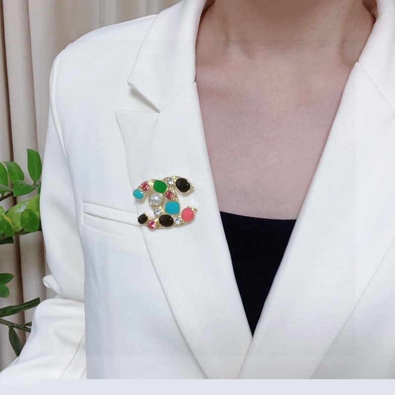 Ch*el brooches